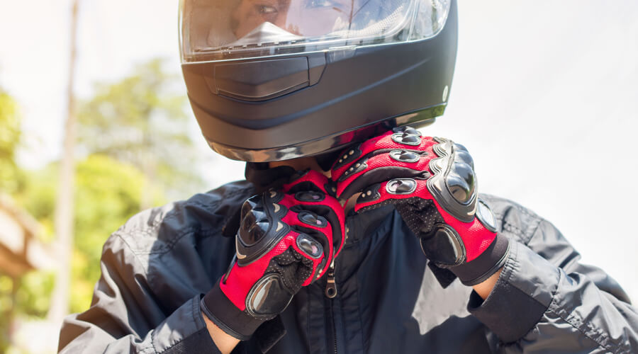 Motorcyclist wears quality helmet for safety.